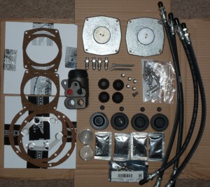 Front brake parts, hoses and hydraulic reservoir top plates.
